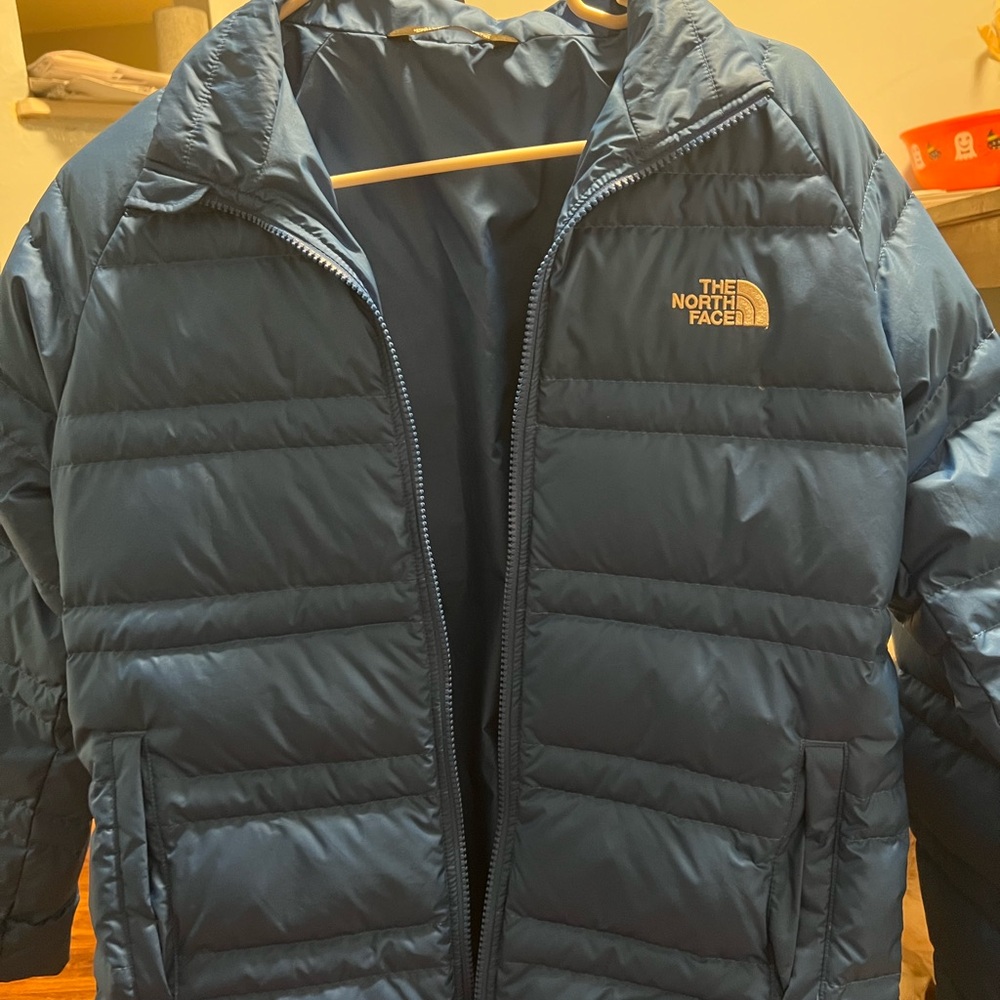 The North Face boys royal blue puffer jacket. Barely worn.